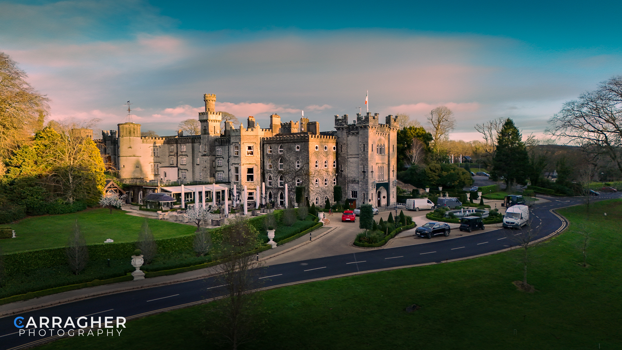 Drone photograph of Cabra Castle in County Cavan, Ireland, showcasing the historic castle, landscaped grounds and surrounding countryside